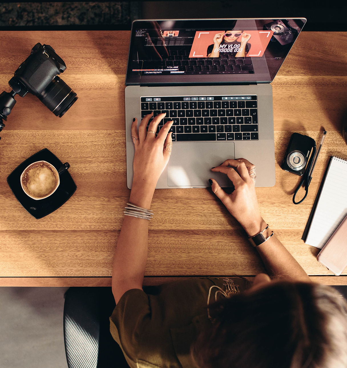 Student editing a video story